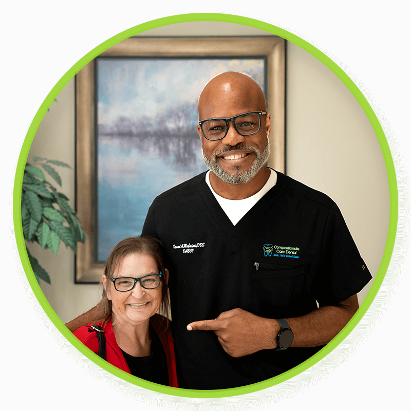 Dr. Dawud Muhaimin smiling with patient