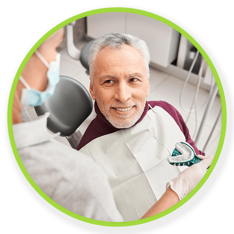 patient getting fitted for dentures